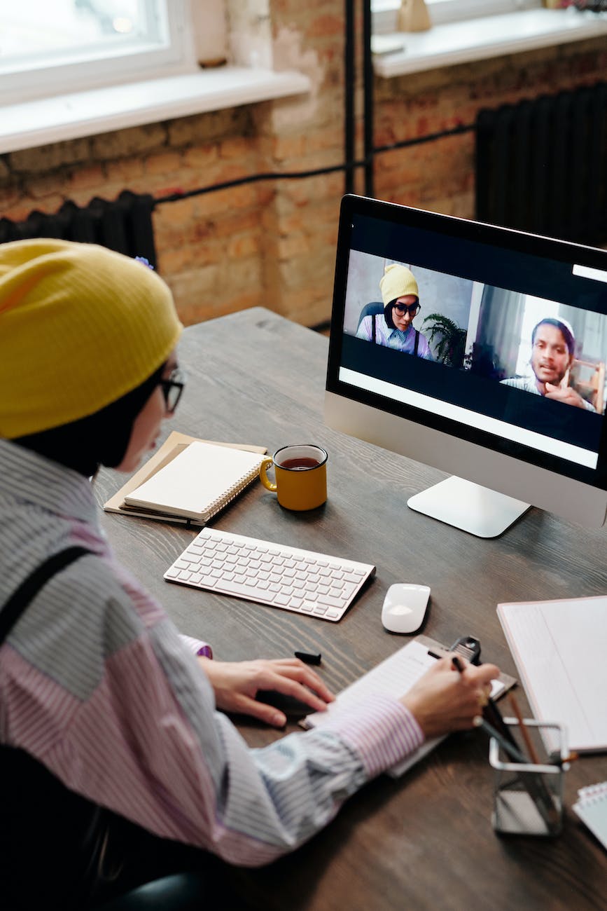 woman talking on video call on computer