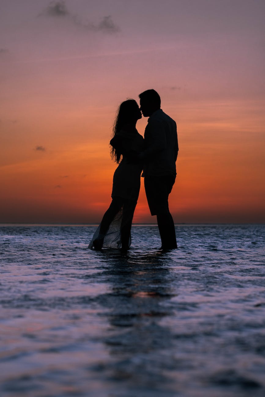 silhouette photography of man and woman